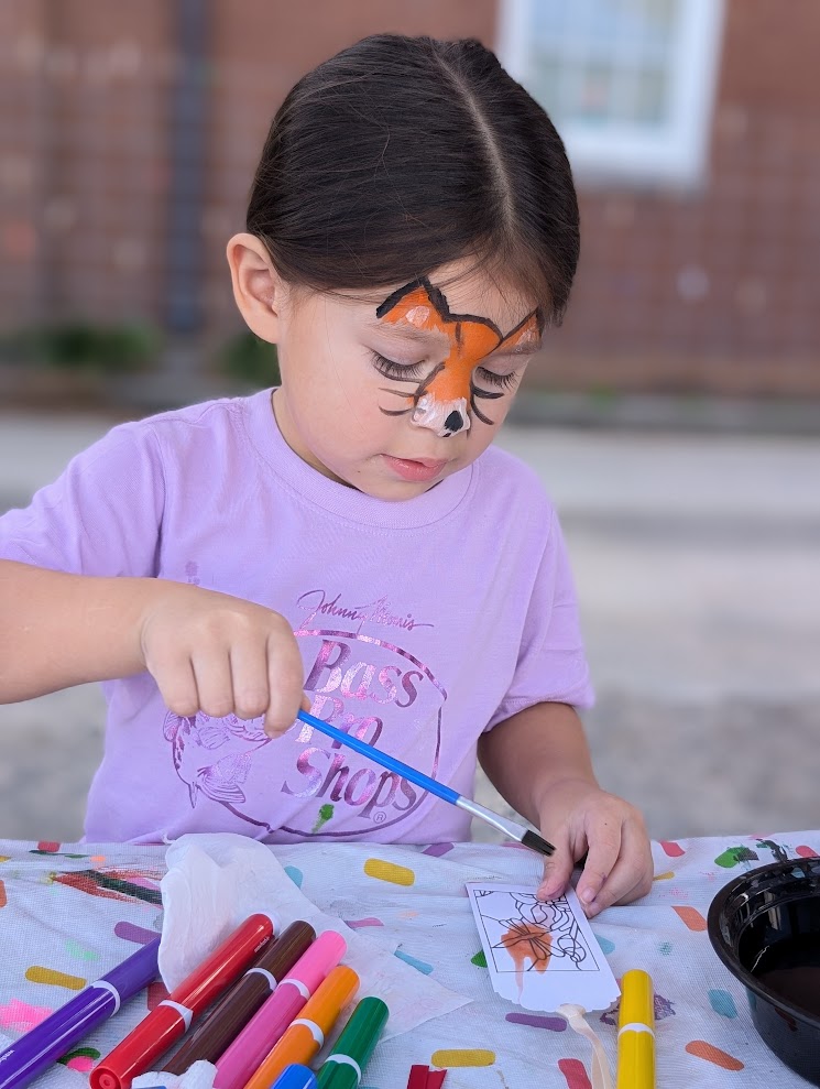 A child participating in the 2024 Arts Affair.